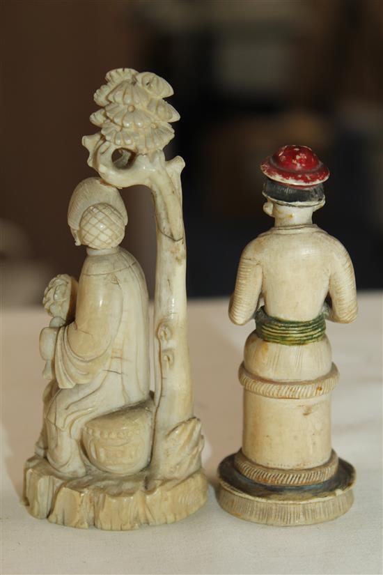 A Chinese ivory figure of a lady seated beneath a tree and an Indian ivory figure of a seated man, 19th century, 10.5 and 8.5cm